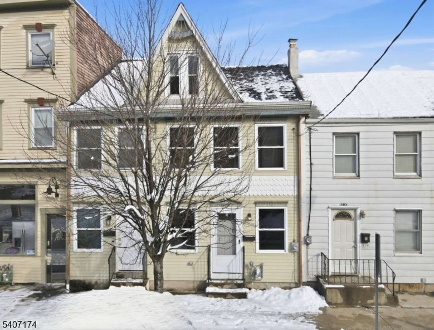 Motivated Seller! Welcome to this modern, updated, move-in-ready 2-bedroom, 1-bath home located in beautiful Phillipsburg. A partially finished attic provides flexible bonus space ideal for a home office, recreation room, or additional storage. This bright and inviting home features an open-concept floor plan with a spacious family room and dining area. Durable, waterproof vinyl flooring flows throughout, combining style with everyday practicality. The upgraded kitchen is equipped with brand-new stainless steel appliances, including a microwave, stove, and refrigerator, complemented by quartz countertops and a sleek tile backsplash. The fully renovated bathroom showcases ceramic tile finishes and new vanities, offering a fresh, modern design. Additional highlights include energy efficient gas heat, central air conditioning, a detached one-car garage, and a fully fenced yard, perfect for outdoor entertaining. A large basement provides ample storage options. Conveniently located near major highways for easy commuting to PA and NY, as well as community parks, shopping, dining, and more. With very low taxes, this home is an excellent opportunity for a first-time homebuyer or an investment property. This home will not last long schedule your showing today!