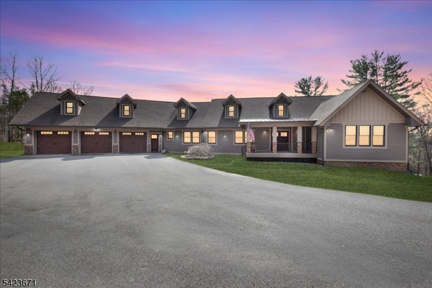 Custom-built 2020 raised ranch set on 13.28 private acres in Far Hills with farmland assessment and low taxes, offering the perfect blend of luxury, privacy, and functionality. Approx 6,978 SF with potential to expand to over 10,000 SF, featuring 9' ceilings, open-concept living, and exceptional craftsmanship throughout. The stunning primary suite boasts a spa-like bath with steam shower, heated floors, quartzite finishes, and custom closets. Chef's kitchen with JennAir professional appliances, quartzite countertops, custom cabinetry, and oversized island. Full walkout lower level offers gym, flex spaces, full bath, and expansive recreation areas with direct backyard access. Resort-style grounds include gunite pool, spa, outdoor kitchen, and beautifully designed entertaining spaces. 3-bay garage, smart home features, and premium finishes throughout. Private yet minutes to town, golf, equestrian facilities, NJ Transit, and easy access to Manhattan. Close to shopping, dining, and recreation an exceptional opportunity in one of NJ's most sought-after locations.Address is - 235 Longview Road, Far Hills, NJ 07931