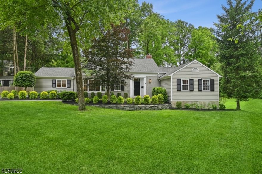 Nestled on a tranquil cul-de-sac in the highly sought-after Poets section, this raised ranch home boasts five bedrooms and three baths, and is just a short distance to Hartshorn School. Completely updated and move-in ready, the home features a beautifully landscaped, park-like property with lush plantings, a stunning bluestone patio and a newly painted exterior. Recent updates also include a redone driveway, a new garage door opener and replaced outdoor drainage system, ensuring the exterior is in excellent condition. Inside, the home offers a thoughtful layout with bedrooms on two levels. The main level houses an ensuite primary bedroom along with two additional bedrooms and a full bath making it a great option for one-floor living. High-end details abound, such as new doors, crown molding, and custom built-ins in the closets. The highlight of the home is the luxurious renovated kitchen, which features custom cabinetry, a Wolf gas cooktop, double Wolf wall ovens, Subzero and Miele appliances, a beverage refrigerator, and a large island with quartz countertops. The convenient two-car attached garage is located just off the kitchen. Upstairs, you'll find two more bedrooms and a full bathroom. The expansive partially finished basement offers tremendous space and versatile options. Notable amenities include numerous high-end features and meticulous updates throughout, making this home a perfect blend of comfort and sophistication.