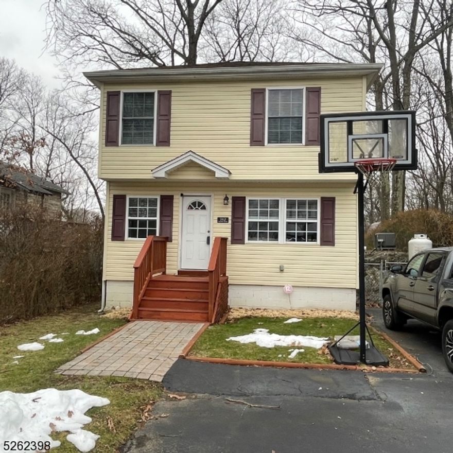 MOVE-IN READY, 3 BEDROOM, ONE & A HALF BATH COLONIAL ON A QUIET STREET.  MODERN KITCHEN FEATURES GRANITE COUNTERS, GLASS-TILED BACKSPLASH, STAINLESS APPLIANCES. THE FIRST FLOOR ALSO INCLUDES A LIVING / DINING ROOM, POWDER ROOM AND LAUNDRY. THE SECOND FLOOR HAS 3 BEDROOMS & SPACIOUS BATHROOM. OTHER FEATURES:  CENTRAL AIR, LOTS OF CLOSETS, RECESSED LIGHTING.  MOVE RIGHT IN AND ENJOY ALL THAT LAKE HOPATCONG OFFERS. NEW HOT WATER TANK 2023. ROOF IS 8 YEARS OLD. NEWLY STAINED DECK OFF THE KITCHEN IS PERFECT FOR ENTERTAINING AND BBQS.  LEVEL, FENCED-IN BACKYARD WITH SHED FOR OUTDOOR FUN (TRAMPOLINE CAN STAY). DRIVEWAY PARKING FOR THREE CARS. PUBLIC SEWER! ENJOY NEW JERSEY'S LARGEST LAKE JUST A SHORT DISTANCE AWAY. CLOSE TO SCHOOLS, SHOPPING, RESTAURANTS, MAJOR HIGHWAYS & PUBLIC TRANSPORTATION.