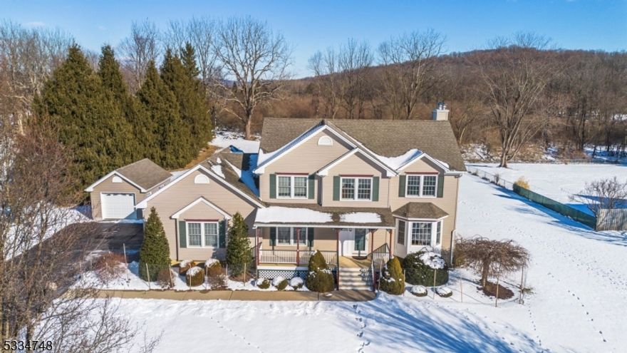 Nestled in the desirable Pondview neighborhood,  This magnificent updated 4-bedroom 3.5 bathroom colonial features many custom upgrades. The recently remodeled first floor boasts a stunning kitchen equipped with top-of-the-line Bosch appliances, perfect for culinary enthusiasts. Hardwood floors, ceramic tile kitchen floor, and whole house generator with 9 years remaining guarantee. The primary bedroom features a new luxurious walk-in shower and walk-in closet. Additional updates include: Windows replaced in 2016 for enhanced energy efficiency, and a durable 30-year roof installed in 2009. The Main 2 1/2 car garage has epoxy-coated floors and an additional detached garage with electric service and epoxy-coated floors. The finished basement offers extra living space with a full bathroom and a convenient Bilco door. Awesome,  backyard with a spacious deck leading to the large above-ground pool. Mature landscaping. Convenient to commuting access to NYC routes 46,80,206, & 31. Don't miss the opportunity to own this move-in-ready gem in Independence Twp!