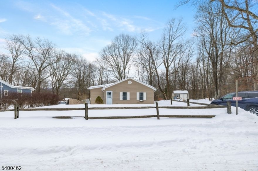 Tucked away on a peaceful dead end road in Stillwater, this meticulously maintained 2 bedroom, 1 bathroom single level home offers the perfect blend of comfort, simplicity, and serenity. Enjoy easy one-floor living with a spacious main living area that flows seamlessly into an additional den and/or dining space, creating a flexible layout for everyday living, entertaining, or a dedicated home office. The kitchen and bathroom feature tile flooring, and the home has been lovingly cared for throughout. Step outside to the rear deck and enjoy the indoor-outdoor connection, perfect for morning coffee, outdoor dining, or unwinding at the end of the day in total peace and quiet. Move-in ready and low maintenance, this is an ideal full-time residence or weekend retreat, just a 5 minute drive to downtown Stillwater and minutes from the natural beauty that makes the area so desirable.