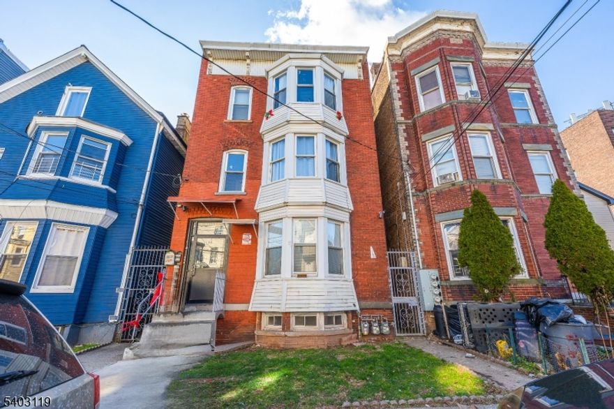 Perfectly located in a high-demand, transit-oriented area, this income-producing three-family property is within walking distance to shopping, dining, the Elizabeth train station, and multiple NYC bus lines making it highly attractive to tenants and ideal for commuters. Each of the three units offers 3 bedrooms and 1 full bath, supporting strong rental demand. An excellent opportunity for investors seeking consistent cash flow, long-term appreciation, and reliable income, as well as owner-occupants looking to offset housing costs with rental income.