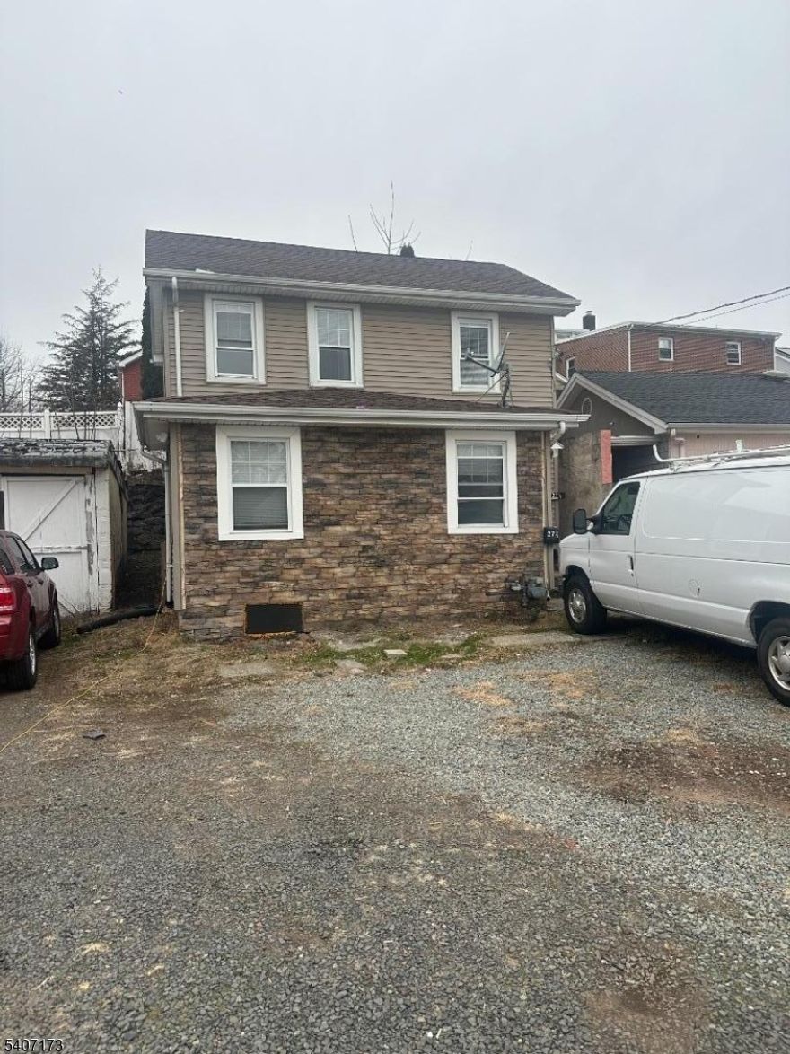 Exceptional investment opportunity featuring a three-family, income-producing property situated on one large lot. The duplex currently offers two side-by-side two-bedroom, one-bath units, while the single-family home provides three bedrooms and one bath?ideal for maximizing rental income or mixed-use occupancy. The property includes a three-car garage and separate utilities for all units, enhancing long-term value and ease of management. One residential unit and the garage require complete rehabilitation, presenting strong upside potential for investors or renovators. Sale is limited to cash or 203(k) financing only. Buyer responsible for obtaining the Certificate of Continued Occupancy (CCO).