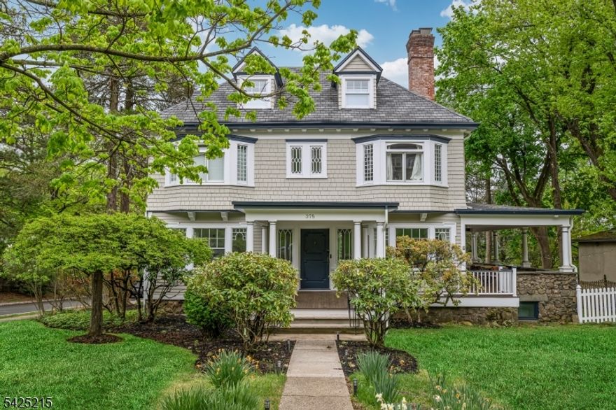 JUST Listed in Montclair, New Jersey   The Montclair lifestyle New York buyers search for. Ideally located just one block from the NYC direct train with an easy Midtown commute, and moments to vibrant Uptown Montclair filled with top-rated restaurants, cafes, boutiques, and parks. This sun-drenched, move-in ready home offers 6  BRs 3 full and 2 half baths with a flexible floor plan perfect for today's lifestyle. Timeless charm meets modern updates throughout, featuring a classic wraparound porch for seamless indoor-outdoor living, now complete with a built-in projector for elevated entertaining and outdoor movie nights. Kitchen w/Sub-zero & Viking applcs opens to a private deck, creating the perfect flow for indoor-outdoor dining, while the backyard is thoughtfully designed with a paver patio, BBQ area, & a lounge space strung with ambient lighting   ideal for hosting or relaxing year-round. Inside, enjoy bright, airy living spaces, high ceilings, and abundant natural light. The finished basement adds bonus living space that can be divided with built-in pocket doors,  with a recreation area, perfect for a playroom, gym, or media lounge. Recent upgrades include a newer roof & EXT Paint (3 years) offering peace of mind. Set on a beautiful, tree-lined street in one of Montclair's most desirable neighborhoods, A rare opportunity combining location, space, and lifestyle. Perfect for buyers seeking that true Montclair feel with effortless access to NYC!MAKE THIS YOUR NEXT ADDRESS!