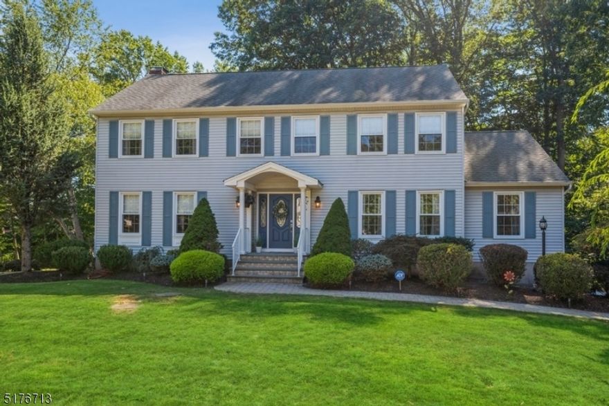 Spacious, private & quality home in a prime location! Classic & elegant Center Hall Colonial is nestled on an oversized, manicured lot on a desirably tranquil cul-de-sac just 40 mi from Midtown. Located in Randolph, a true NJ hidden gem, this freshly painted home is close to wilderness trails, farmers' markets & Shongum Lake, w/easy access to shopping, dining, major highways & NYC direct train. Highlights features hardwood flrs, refined crown molding, trim work & generous everyday living & entertaining spaces enveloped in abundant natural light. A beautiful stone paver walkway guides you inside to a bright foyer w/French doors opening to a sun-filled LR. The formal DR has a chair rail & ample space for gatherings. The eat-in kitchen is equipped w/granite counters, warm wood cabinetry & a center island. Sliding glass doors open to the expansive, partially covered deck with plenty of room for outdoor cooking & relaxing. Enjoy chilly winter nights around the cozy wood-burning fireplace in the FR including built-in bookshelves & a sunrm area w/a vaulted ceiling & skylights. A powder rm, convenient laundry rm & an office complete this level. Second flr the luxurious primary BD w/a huge WIC, en suite Bth including a dual-sink vanity & oversized glass shower, along w/3 addt'l Bds & hallway Bth. The finished basement offers a spacious rec-room, access to the attached 2-car garage & extra storage space. To top it all off, this home is set on a beautifully landscaped, 3-quarter ac lot.
