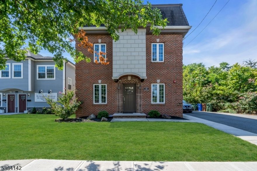 Fully rebuilt in 2015 from the foundation up, this exceptional mixed-use property combines modern construction with classic NYC-style charm. Constructed of durable masonry brick/block and stucco/frame, the two-story building spans approximately 25' x 55' and features 9-foot ceilings, elegant crown molding, and hardwood floors throughout. The first floor offers a professional office space, which includes a conference room and a half-bathroom, with an estimated rental value of $2,000, along with a one-bedroom apartment. This highly versatile setup makes the property attractive to both investors and end-users. Additional features include a partial basement with crawl space, and a massive full attic with approx. 1,300 sq. ft. of accessible storage via pull-down stairs. Efficient electric split systems and forced air provide heating and cooling throughout the building. The exterior boasts a five-car parking lot and a deep, low-maintenance rear yard. A turnkey opportunity with solid income potential in a highly desirable location. Prior to seeing the house, the buyer must provide a POF and Pre-approval letter.