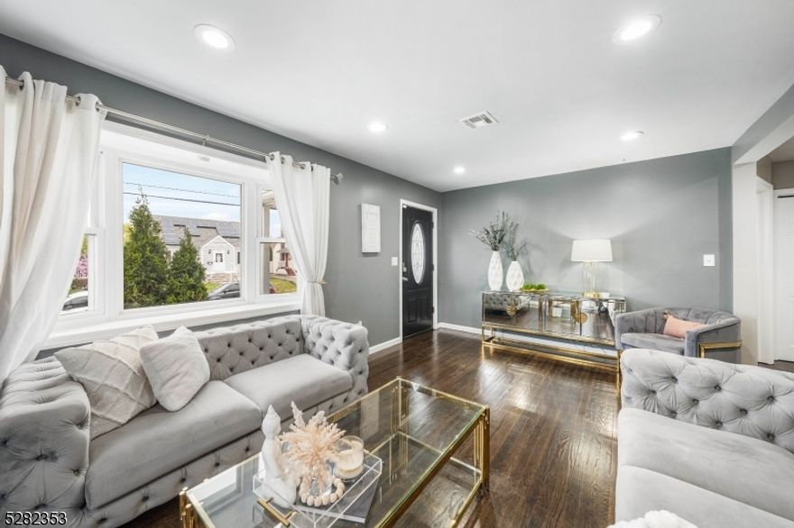 Welcome to your charming, renovated Cape Cod retreat! This beautifully updated home BOAsts an array of features perfect for modern living. With 3 bedrooms and 3 baths, including a full finished basement with family room, two additional rooms, a convenient full bath, and a summer kitchen, there's ample space for relaxation and entertainment. Step inside and be greeted by a warm and inviting living room with hardwood floors, ideal for cozy gatherings or quiet nights in. The renovated kitchen is a chef's delight, featuring sleek countertops, modern appliances, and ample cabinet space for all your culinary needs. The renovated baths offer a touch of luxury, with elegant fixtures and finishes creating a spa-like atmosphere for relaxation and rejuvenation. Spacious fenced in backyard great for summer gatherings. Enjoy the comfort of central AC throughout the home, ensuring a cool retreat on warm summer days. With parking for 3 plus cars, convenience is at your doorstep, making coming and going a breeze. Whether you're seeking a peaceful oasis or a place to host, this renovated Cape Cod offers the perfect blend of comfort, style, and functionality. Great location near Linden train station and downtown. Don't miss your chance to Call this lovely property home!