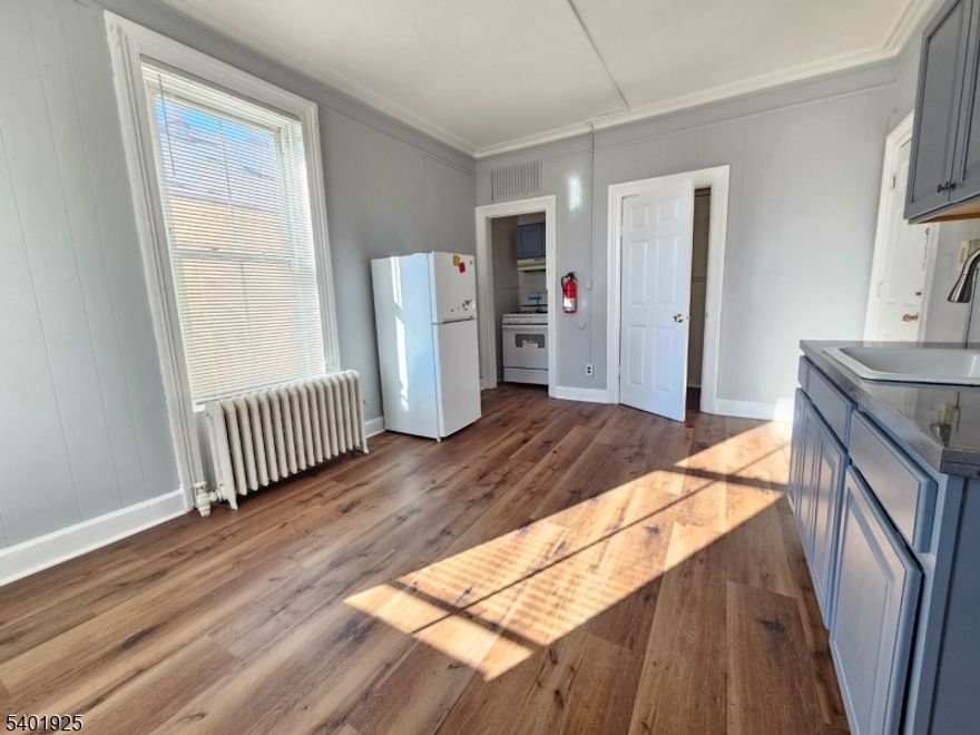 This freshly renovated studio is located in a great location for commuters. Located on the second floor, with large windows to let in lots of natural light. Freshly painted and new vinyl plank flooring. Large bathroom and good closet space. Heat and hot water included in rent! Common laundry located in the basement.