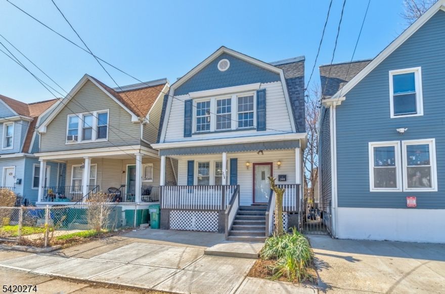 Welcome to this beautifully fully renovated Colonial one-family home in Newark, offering 3 bedrooms and 2.5 baths with approximately 1,480 sq ft of well-designed living space on a spacious lot. The first floor features a bright and inviting layout with a comfortable living room, formal dining room, brand-new modern kitchen with updated finishes, new flooring throughout, and a welcoming foyer perfect for both everyday living and entertaining. The second floor offers three generously sized bedrooms, including a master suite, along with two full bathrooms designed for convenience and functionality. A full basement with a half bath provides excellent additional space for recreation, storage, or potential customization, with washer and dryer connections to be installed prior to closing. Enjoy the convenience of driveway parking and a spacious backyard ideal for outdoor gatherings, gardening, or relaxation. Conveniently located on a commuter-friendly street near schools, shopping centers, parks, and public transportation with easy access to NYC, this move-in-ready home combines modern upgrades with classic charm and exceptional value.