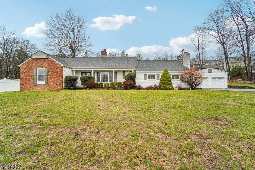 Spacious, versatile, and charming, this home checks all the boxes. The heart of the home is an expansive eat-in kitchen featuring a center island and sliding glass doors that open to the backyard?perfect for indoor-outdoor living. Just off the kitchen, an enormous family room/playroom offers endless possibilities for gatherings, relaxation, or recreation. The first floor also includes a formal dining room and a cozy living room with a wood burning fireplace.  You'll find two bedrooms and two full baths including the primary suite.  On the second floor you will find two more spacious bedrooms.   This home is complete with a breezeway/mudroom which connects the home to the oversized two car garage and offers is own exterior entrance, ideal for busy lifestyle.  The attached garage offers ample storage space and a bonus room which leads to the rear yard and pool area.  It is the perfect blank slate for a pool house, cabana or entertaining space.  With exceptional curb appeal.... don't let this home pass you by.  Make your appointment today!