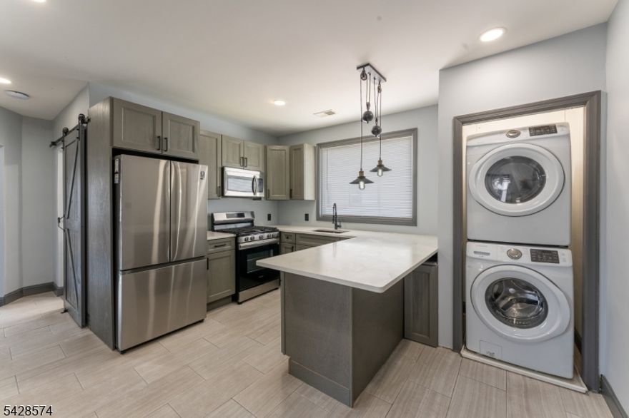 Spacious and sun-filled 3-bedroom apartment offering beautiful natural light throughout. Ideally located near the airport, shopping, and a variety of restaurants, with easy access to major highways for a seamless commute. This well-appointed unit features a generous layout, in-unit washer and dryer, and includes parking for added convenience. Rent covers parking, WiFi and water, making this an exceptional value. A perfect blend of comfort, location, and functionality don't miss it!