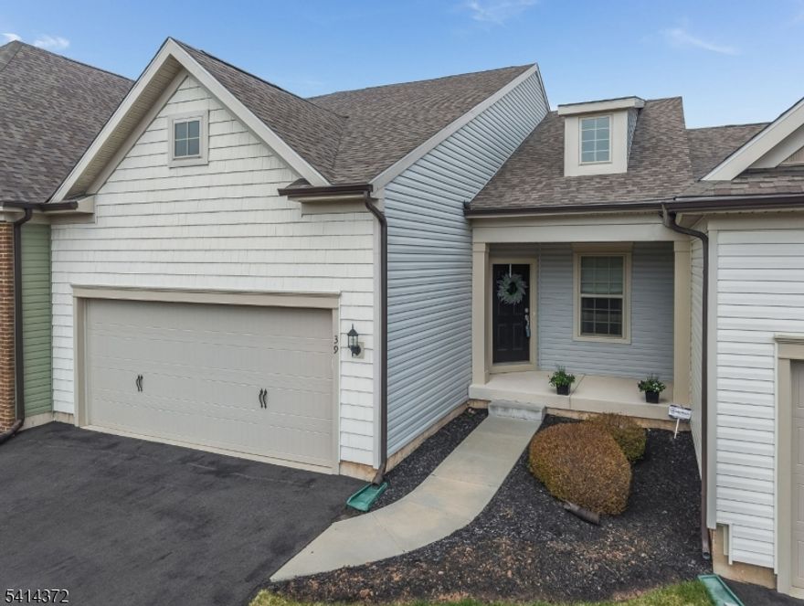 Live your best life in the active adult 55+ community of Hunterdon Creekside. 2022 Turin model w finished walk-out LL offers 2243 SF. Thoughtfully designed open concept living on one floor. Gourmet kitchen features shaker-style cabs in "Barnett Linen", granite tops and a suite of SS Whirlpool appliances. Center island w double sink provides storage and breakfast seating + more storage in the pantry closet. Encino Oak HW flooring in "Hazelnut" flows from kitchen to cafe dining area and into the gathering room. Sliding door opens to a maintenance-free deck overlooking private, treed setting. At the front of the home, the flex room/den offers LED lighting and plush "Cappuccino" carpet. A half bath and laundry room w W & D. The spacious owner's suite features walk-in closet, en suite bath w  "Fairfield Truffle" & white marble double vanity, seated shower. Bathrooms are finished w "Cannes Crema" tile flooring. The finished walk-out daylight LL expands the living space w a large recreation/media room featuring rec lighting and premium carpet. Atrium door leads to a crushed stone patio. This level also includes a 2nd BR, full bath and ample storage/utility space. Additionally: 2 Car Garage w Opener; Security System; Professionally Landscaped Lot; Sprinkler System; Public W & S; Transferrable Warranty w 10 Year Structural. Community Amenities Include: Clubhouse, Exercise Room, Pool, Tennis Courts, Pickle Ball & Bocce Ball Courts, Playground, Walking & Biking Trails.
