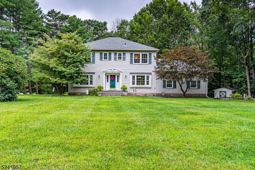 Lovely, Welcoming Colonial in the desirable Alexandria section of Succasunna! Private property nestled within a lovely, sidewalk lined neighborhood. Extremely Well maintained and tastefully updated. Many high end features throughout. Warm and cozy Family Room w/ WB fireplace & slider to stunning back deck. Large, eat-in-kitchen boasts tons of counter space. Magnificent first floor layout includes Formal Dining & Living Rooms which are bookend to the Foyer. Convenient powder room & laundry/mudroom w/ access to 2 car garage. Gorgeous hardwood flooring throughout. Upstairs, the primary Suite offers a walk-in closet & en-suite bath. 3 Additional generous sized bedrooms & the 3rd full bath complete the floor. The spacious, finished basement offers additional living space with rec room area, office & storage! Tons of storage. Over an acre on a corner lot, on a quiet cul de sac. Large lawn and deck for enjoyment. A showcase home! Great location, just mins from Ledgewood/Roxbury Shopping Centers, major highways and mass transportation. Newer roof, central air system and windows (2 years young).