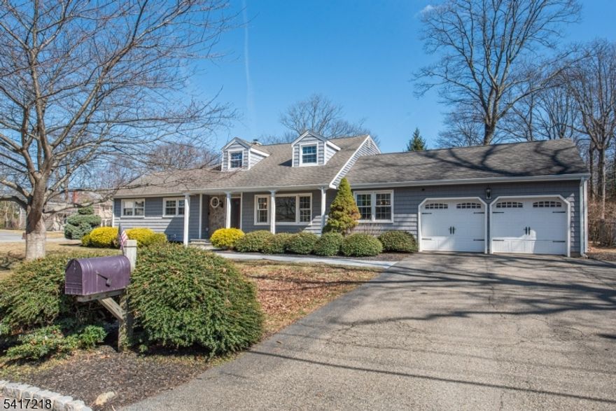 Welcome to this sun-filled, meticulously maintained Expanded Ranch, a hidden gem in Randolph. Nestled in a highly sought-after neighborhood on a level lot, this 5 bedroom, 3 full bath property offers the ultimate in versatility and space. The heart of the home features a seamless open floor plan where an updated kitchen with stainless steel appliances, quartz countertops, and huge center island flows effortlessly into the family room, anchored by a cozy wood-burning fireplace and sliders that open to a private patio. The highly desirable first floor primary suite provides a private en-suite bath and spacious walk-in closet. With 4 additional bedrooms and 2 full baths, there is plenty of room for guests, a home office, or a growing household. Hardwood floors throughout. A fully finished basement with carpeting provides provides additional living space - perfect for a home gym or play room. Enjoy the total ease of all public utilities. Located in the highly-rated Randolph school district and minutes from the Midtown Direct train in Morristown, this home offers the perfect balance of suburban tranquility and urban convenience.