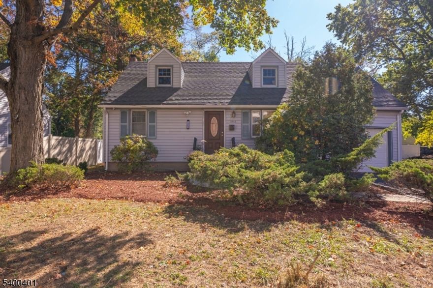 Welcome to this spacious and beautifully upgraded Cape Cod home surrounded by lush greenery and mature landscaping. The main level features two comfortable bedrooms, a renovated full bath, a bright and inviting living room, and a charming eat-in kitchen perfect for sharing great meals and entertaining. Upstairs, you'll find a large third bedroom plus an additional versatile room that can easily serve as a fourth bedroom, home office, or hobby space. The partially finished basement offers even more living space, complete with a renovated half bath, laundry area, and ample storage. Step outside to enjoy your beautiful backyard oasis, featuring a huge deck, storage shed, and plenty of greenery ideal for outdoor gatherings or peaceful relaxation. Additional highlights include a freshly painted interior, numerous modern upgrades, and an attached garage for added convenience. This move-in ready home combines comfort, character, and thoughtful updates ready to welcome its next owner!