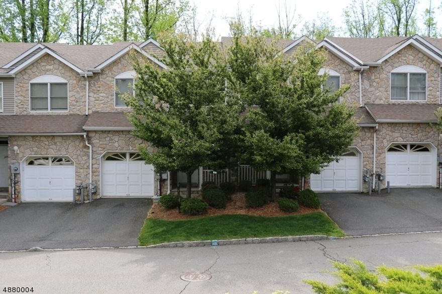 NOW AVAILABLE!  TULIP MODEL!  Hardwood Floors on first level, double story entrance.  Open Kitchen floor plan with a deck looking out to wooded lot.  Second floor bedrooms each with their own full bathroom.  Walk-in closet in Master Bedroom.  Full basement with a walk-out featuring sliding glass doors to the backyard.  Morris Plains and Denville train station a short drive away.