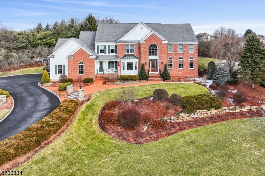 Your dream home awaits at this private oasis located on a quiet cul-de-sac in one of Randolph's most desirable neighborhoods. Resting on just over an acre of landscaped & private property, this gorgeous home features 4 BR's, 2 full & 2 half BA's. The Renovated kitchen features custom cabinets w/ soft-close custom drawers, hideaway cabinets w/ pullout lifts, granite counters, marble backsplash, soapstone sink w/ filtered cold & instant HW, top of the line Thermador appliances, radiant heated flooring and more. The Primary suite on the 2nd floor features a tray ceiling, custom blinds, hardwood floor, 2 walk-in closets & an en suite spa-like full BA with jacuzzi tub, Hotwater baseBOArd radiant heat floor, double sinks w/ granite counters, privacy door for the stall shower & toilet. The 2nd floor features Hardwood throughout, 4 bedrooms, a main BA and a 34x11 gorgeous bonus recreation room. private and beautifully landscaped, this property is magnificent. Enjoy the Bluestone patio in the rear yard w/ a outdoor custom bar area featuring a pergola, counters, a built-in grill w/ gas burners, a stone fireplace & a hot tub. 3 car garage, a circular driveway, custom lighting, beautiful landscaping complete the outdoor features.