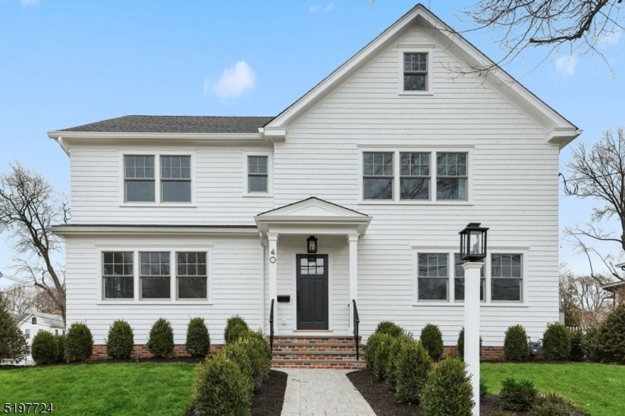 SPECTACULAR 6 BEDROOM AND 5.1 BATH NEW CONSTRUCTION ON MADISON HILL BY LOCAL BUILDER W.P LLOYD CUSTOM HOMES. This true "in-town" location is a block from town and surrounded by beautiful homes in the historic and charming Tuttle Oak District. This gracious home features custom moldings and finishes, high ceilings, hardwood floors, and wonderful flow throughout the bright and open floor-plan. The gourmet kitchen has high-end chef appliances, large Quartz center island, walk-in pantry and butlers galley. Bright eat-in area opens to the great room with coffered ceiling, gas fireplace and sliders to the deck overlooking landscaped yard.  Elegant foyer, living and dining rooms offer an abundance of space to entertain. Primary retreat features a spa shower, radiant floors & double walk-in closets. 3 additional en-suite bedrooms and a pretty laundry room finish off the second floor. Fabulous 3rd floor with bonus room and BR/office w/full bath. Walk-out basement features a large rec room and versatile BR/office/gym with full bath; mudroom with built-in cubbies and access to oversized garage. WALK TO EVERYTHING THAT MADE NJ MONTHLY NAME MADISON THE #1 TOWN TO LIVE IN...charming downtown with wonderful restaurants/bars; easy NYC/Hoboken trains; wonderful shops; parks & top-ranked schools. This efficient turn-key home is ready to move in and comes with builders warranty. COME TOUR 40 PROSPECT STREET TO APPRECIATE ALL OF THE AMAZING FEATURES AND DETAILS!