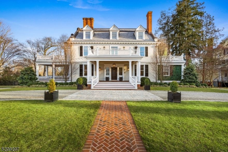 Nestled on one of the most coveted blocks in Morristown NJ, this well appointed fully renovated custom colonial presents the epitome of sophistication elegance and grandeur. Offering 2.82 acres of lush, meticulous landscape and tranquil privacy, this awe inspiring 12,000+ square foot home is designed for the discerning with gracious living & entertaining spaces, multiple outdoor areas with a covered porch, large bluestone patios & decks, a pergola with fire pit & an in-ground heated pool. This expansive 7 bedroom, 6.5 bath estate has impressive elements; a long circular front driveway, stately covered entry, parking for 12+ cars, an oversized detached garage, elevator + state-of-the-art systems (central vac, 4-zone AC, lawn irrigation, audio/visual & security). Impeccable interiors reflect the utmost attention to detail, with multiple fireplaces, stunning millwork & woodwork, and a refined finish throughout. Formal living & dining rooms, a premium chef's kitchen, with built in seating, billiard room w/wet bar, sitting rooms, a handsome office, primary suite with outdoor access, finished attic & full basement heighten the allure.