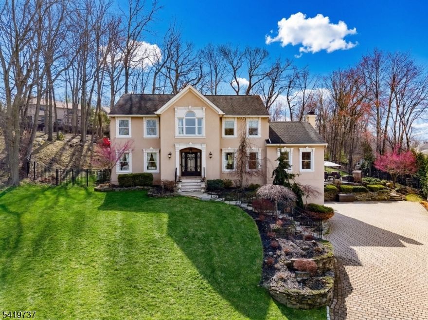 Stately Colonial set on a quiet cul-de-sac in one of Wayne?s most desirable neighborhoods. This beautifully updated and completely renovated home offers the perfect blend of timeless design and modern upgrades, ideal for both everyday living and entertaining, & features a true backyard oasis. A spacious entry foyer leads to formal LR and DR, while the dramatic family room features vaulted ceilings, a fireplace, & iron French doors that open to the backyard. The gourmet eat-in kitchen is equipped with custom cabinetry, new marble countertops, center island, Viking stove. Bedroom on the main level & half bath with backyard access for pool guest convenience! Upstairs, the primary suite offers a walk-in closet & a beautiful en-suite bath. Dreamy brand new laundry room and 3 addt'l bedrooms plus a newly renovated hall bath complete the second level. A finished basement provides additional rec and living space, with a partially finished bonus space that would make a great office or gym in the future. The backyard is a true highlight, offering a private, resort-style setting with a heated in-ground pool (brand new liner), limestone patio, custom wood-burning firepit, & a fully equipped outdoor kitchen with grill, burner, & warmer. Additional features include custom iron front and rear doors, custom paint, high-impact storm windows, whole house generator, two-car garage, and a brick paver driveway. Ideally located close to top-rated schools, shopping, parks, & NYC access.