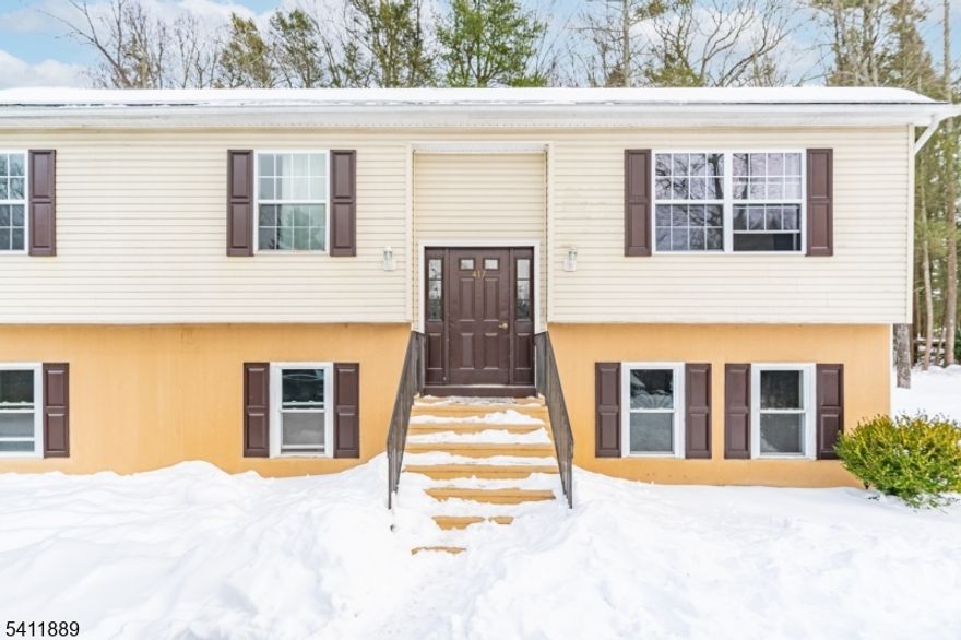 Welcome to your new home at 417 Deerfield Lane, where lifestyle meets comfort in the heart of the High Point Country Club. This isn't just a home; it's your gateway to a vacation-style living experience every single day. Perfectly situated within walking distance of the golf course, sparkling community pool, the Lake and professional-grade tennis courts; this location delivers. This impeccably maintained home offers a spacious and bright bi-level layout designed for modern living. The heart of the home is a massive kitchen featuring sleek flooring and an open, airy flow that makes entertaining a breeze. With 4 generous bedrooms plus an additional versatile room on the lower level, there is plenty of space for a home office, gym, or guest suite. The lower level is built for relaxation, featuring a large family room with sliders that lead directly to a sprawling backyard perfect for summer BBQs and outdoor play. Stay comfortable all year long with the convenience of central heating and cooling, and two full baths. As a unique bonus, the sellers are open to including some furniture in the sale, making this a truly turn-key opportunity. A functional storage shed is also included for all your outdoor gear. Don't miss this opportunity to make this house your home, Book your showing today!