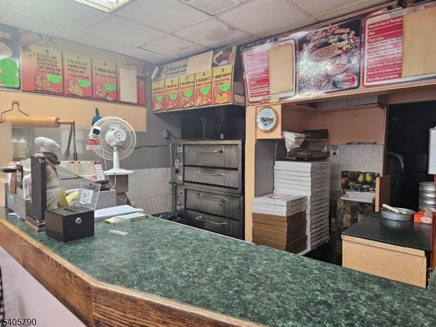 This Pizzeria has been serving the Clifton community for an impressive 30 years. With a Prime location in this highly populated area where foot traffic flows naturally past your door every day. Picture this: you're positioned perfectly near major highways and convenient bus stops, making it easy for customers to find you whether they're commuting, shopping, or just exploring the neighborhood. Here's what makes this opportunity even sweeter - you'll benefit from remarkably low rent, which means more money stays in your pocket each month. When you step into ownership, everything you need comes with you: all equipment is included along with current inventory, so you can start serving customers from day one.Thirty years of operation means this business has weathered every challenge and proven its staying power. You're not just buying a restaurant; you're inheriting a neighborhood institution with deep community roots and proven profitability. The location does the marketing for you with its natural visibility and accessibility. Whether customers are grabbing a quick slice during their commute or bringing the family for dinner, you'll have the foot traffic and convenience factor working in your favor. This is your chance to own a piece of Clifton's dining landscape with an established reputation, loyal customers, and all the tools for continued success already in place.