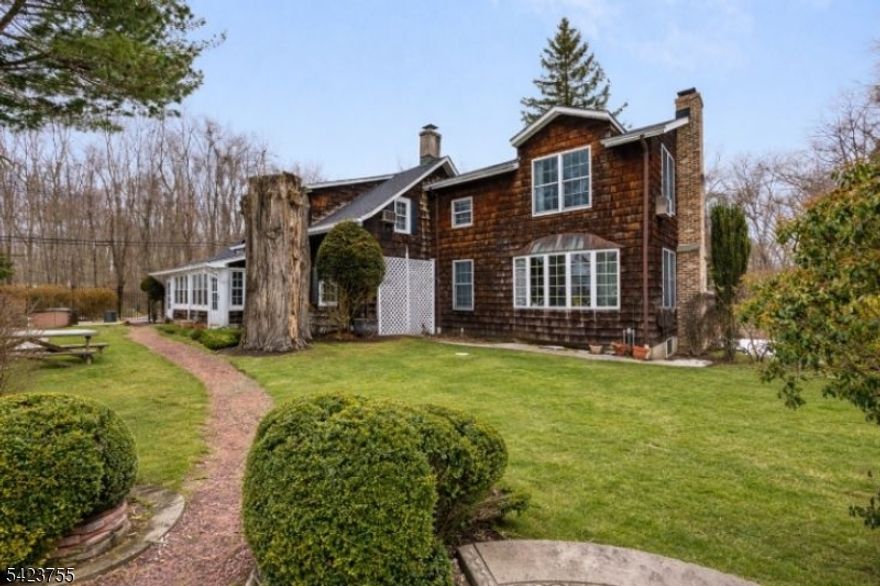 Step into a home where history meets modern living. This extraordinary 1744 residence, complemented by a 1990's addition, along with a seperate one bedroom cottage,  offers timeless charm, beamed ceilings, and cozy fireplaces. The main house features plenty of room for comfortable living and gracious entertaining. Double doors open to a spacious living room with a marble fireplace. An inviting dining room with built-ins is the perfect place for hosting fabulous dinner parties. The kitchen opens to a warm breakfast area surrounded by wood paneled walls and original beams on the ceiling. Upstairs features four bedrooms and an office area, too. A brand-new furnace along with a whole house generator, offers peace of mind.  Guests will love the private cottage, complete with its own kitchen, bath, living areas, creating a warm and inviting retreat year-round. A two-car garage and a separate office. Outside, enjoy your in-ground pool, gazebo, and beautifully landscaped gardens lush with perennials a serene oasis for entertaining or quiet relaxation. Perfectly located for convenience without compromising privacy, this home offers a serene oasis yet is just minutes to highways for easy commuting. As the nation approaches the 250th anniversary of the United States Declaration of Independence, this home offers rare and meaningful connection to early American history while enjoying versatile, modern living. A perfect place to call home!