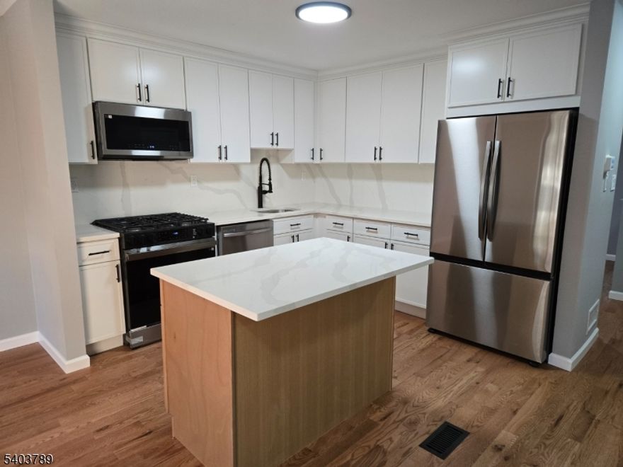 WELCOME HOME!!  THIS UNIT HAS JUST BEEN FULLY RENOVATED!!  UPON ENTERING THE NEW HARDWOOD FLOORS AND OPEN FLOOR PLAN WELCOME YOU. NEW CUSTOM DESINGNED KITCHEN WILL LEAVE YOU BREATHLESS. GREAT FOR ENTERTAINING .  MAIN LEVEL INCLUDESA 2 STORY GREAT ROOM WITH BRICK FIREPALCE OVERLOOKING PATION AND PRIVATE BACKYARD.  HEAD DOWN TO THE BASEMENT WHERE THE POSSIBILITES  ARE ENDLESS!!  25 X 20 OF FINISHED SPACE READY FOR YOUR ENTERTAINIG TOUCHES!!  MOOVING UPSTAIRS TO THE SLEEPING LOCATION  YOU WILL BE MET BY 3 SPACIOUS BEDROOMS FEATURING ALL NEW CARPET AND FULLY REMODELED  BATHROOMS!!   NEW IMPROVEMENTS  INCLUDE FESH PAINT, NEW CARPET, HARDWOOD FLOORS NEW ROOF, AIRCONDITIONER AND MUCH MORE.....