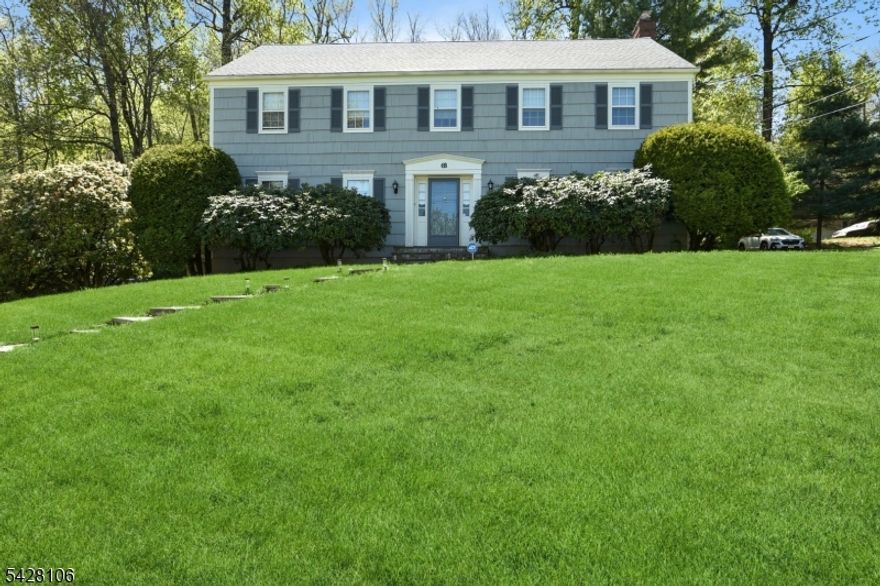 WELCOME TO THIS CHARMING RESIDENCE PERCHED ON A BEAUTIFULLY LANDSCAPED PROPERTY.  THIS HOME OFFERS 5 BEDROOMS LOCATED ON THE SECOND LEVEL AND 2.5 BATHROOMS.  THE FIRST LEVEL OFFERS A FORMAL LIVING ROOM, FORMAL DINING ROOM, GREAT ROOM AND SUNROOM WITH ANDERSEN SLIDERS TO THE DECK, KITCHEN WITH EATING AREA, LAUNDRY ROOM WITH ACCESS TO THE DECK.THE PRIMARY BEDROOM HAS A LARGE WALK-IN CLOSET , DRESSING AREA AND UPDATED PRIMARY BATHROOM. THE BASEMENT FEATURES A FINISHED REC ROOM, UTILITY AREA AND ACCESS TO THE 2 CAR GARAGE. THE REAR YARD HAS A LARGE DECK AND BOASTS A TRANQUIL SETTING.  MUST SEE!