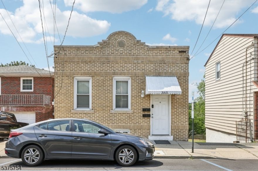 Great 2-family home featuring a 4-bedroom unit with a kitchen, dining room, living room, 2 full bathrooms, and central air. The side entrance apartment offers 3 bedrooms, a kitchen, dining room, living room, full bathroom, and also has central air. Enjoy a private, fenced-in yard with a patio, perfect for outdoor entertaining! Conveniently located near schools, transportation, major highways, and just a short commute to NYC.