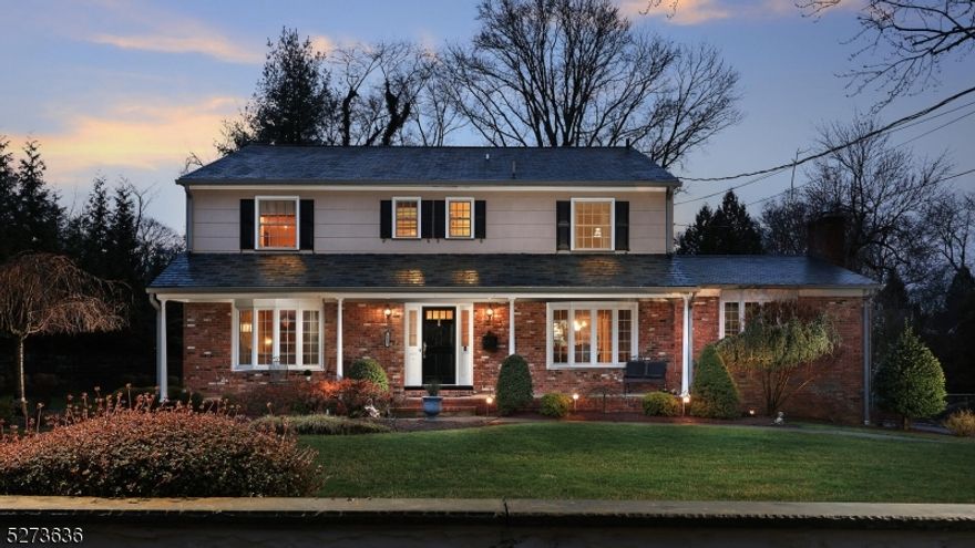 523 Wychwood Road is an exceptional center hall colonial in the highly sought-after Wychwood neighborhood. Offering 5 bedrooms and 3.5 baths, this residence boasts a formal DR, family room, LR, sunroom. Nestled on a stunning .56 landscaped acre, it offers views of nature while maintaining close proximity to a vibrant downtown and transportation hubs. Enjoy picturesque views from the gourmet eat-in kitchen, featuring custom cabinetry, high-end appliances, a center island, and numerous upgrades. The adjacent family room boasts a gas fireplace and seamlessly connects thru the french doors to the light-filled sunroom. The formal dining and living rooms expand the extraordinary entertainment space. A flexible 1st floor great room offers versatility as a en-suite with a private bath, gas fireplace, and walk-in closet. The first floor is completed by a spacious foyer with two coat closets, powder & laundry rooms. On the 2nd floor, a beautiful primary suite awaits, featuring a stunning private bath with double sinks, a steam shower, and abundant custom cabinetry. Three additional bedrooms and a hallway bath with double sink complete the second floor. Hardwood floor under carpet. Oversized attached two car garage. The enormous walk-out basement, with high ceilings provides a blank canvas for your custom transformation. Outdoor living and entertaining are effortless on the raised bluestone patio, overlooking an expansive professionally landscaped oasis.