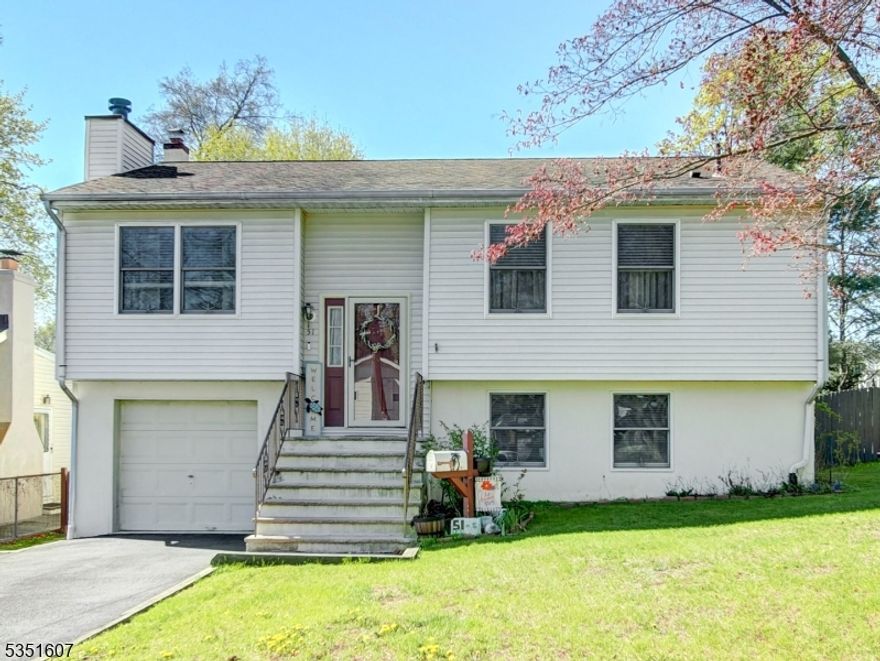 Beautiful bi-level in the Lake Hiawatha section of Parsippany. Conveniently located within walking distance to restaurants and shopping. This well-maintained home boasts pride in ownership. It is move in ready and waiting for someone to add their personal touches to make it their own. Main level includes cozy living rm with wood burning fireplace, dining rm, kitchen, plus 2 brs and 2 full baths (one in the primary bedroom). Ground level has a spacious recreation area great for entertaining or home office, laundry area, large storage close, utility closet, access to 1 car attached garage and the 3rd br. This home sits on a level lot with a deck off of the kitchen great for outdoor dining. The park like lawn also has a brick patio. Don't miss this opportunity to make this beautiful home your own!
