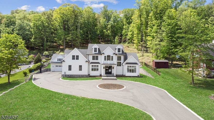 Seamlessly blending architectural elegance with natural beauty, this nearly brand-new custom Colonial is poised to serve as your own masterpiece of organic modern design. Nestled on a sprawling, private lot in a coveted neighborhood, the home's breathtaking backyard oasis and aesthetic finishes harmonize to create your dream escape from your daily obligations. Inside, a flowing open floor plan showcases calming natural elements for living and entertaining with white oak flooring throughout, a high-end kitchen with top-tier appliances, and a butler's pantry fit for royalty. The first-floor primary suite astounds with its fireplace, intricate millwork, and graceful arched transitions. Inside, the home further boasts a second-floor suite, a functional 5th bedroom, extensive trimwork and finishings, a first floor conservatory overlooking the grounds, a massive basement offering endless possibilities, and more.  Outside features a new gunite pool with sun deck, hot tub, covered patio, extensive hardscape, a detached garage with second-floor loft and so much more! The setting, great school system, & convenient access to highways/shopping/dining & NYC truly make this home one of a kind. Don't miss this rare opportunity as your new home awaits. Schedule your private tour today.