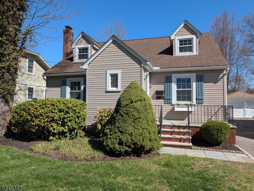 Charming expanded cape ideally situated in the desirable Fairchild section of Morris Township, just moments from schools, shopping, dining, and the Morris Plains train station. The home offers an original formal living room and dining room and wood floors throughout the first floor. The updated kitchen (2017) features a spacious center island with breakfast bar, a walk-in pantry, and opens seamlessly to a bright family room with a convenient office nook and full bath. Enjoy peace of mind with a whole-house carbon water filtration system (2017) and an additional drinking water filtration upgrade completed in 2023.Upstairs, the primary suite offers a walk-in closet and private full bath. Two additional bedrooms with custom built-ins on the second floor share a hall bath.Outside, the level, fully fenced yard provides great space for entertaining or relaxing, with picket fence and gates updated in 2022. A detached garage offers additional storage. Recent improvements include new central air system (2023), new front door (2025), and gutters with covers (2025).