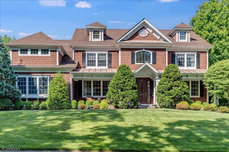 Welcome to your dream home! This stunning 6-bedroom residence including first floor suite, has been completely rebuilt just eight years ago and offers the perfect blend of modern luxury and timeless elegance. The heart of the home is the custom kitchen, featuring exquisite quartzite countertops and marble tile. Every detail has been meticulously crafted, including a custom-designed mudroom and pantry. Dining room is flanked with custom wallpaper and meticulous wall trim design. The family room features coffered ceilings and marble tiling around the gas fireplace. Grass-cloth handwoven window treatments in the kitchen add that touch of sophistication. The spacious master bedroom boasts vaulted ceilings, gas fireplace and large custom walk-in closet. Custom built ins adorn the office space also on the second floor. The home has state-of-the-art insulation for ultimate comfort. The luxury doesn't end on the main floors. The basement is a retreat featuring a spacious family room perfect for movie nights and gatherings, a desk with ample work space. Adjacent to the family room is a private home gym, offering a convenient place for workouts. Adding a touch of elegance, is the wine cellar adorned with a stunning chandelier. Third floor is fully finished and carpeted, great for a play room.  The home has state-of-the-art insulation for ultimate comfort and lastly the home is equipped with a full-house generator for peace of mind. A  true masterpiece, ready to welcome you home.