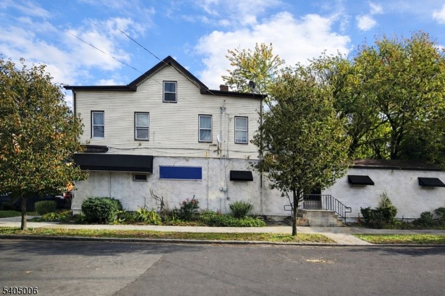 Mixed-use property located on a high-traffic corner along Summer Street, surrounded by established businesses. The first floor houses an attractive tavern, while the second floor offers a spacious three-bedroom apartment. The tavern and apartment have separate utilities. The sale includes a Class C liquor license, permitting both on-premise and off-premise alcohol sales.