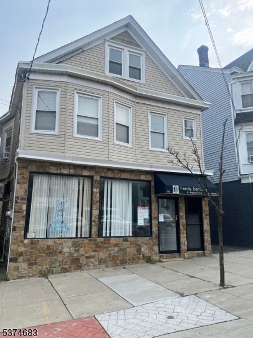 Don't miss this well-maintained mixed-use property featuring an approximately 1,300 / 1,400 sq ft commercial space on the first floor, currently operating as a dental office, featuring three built-out rooms, lab, storage rooms, 1 full bath and 2 half baths, and central air throughout. The unit will be delivered vacant ready for your own business or a new tenant. Upstairs you'll find a spacious 3-bedroom, 1-bath residential unit, ideal for rental income or owner occupancy. The property also offers a full walk-up attic with potential for expansion, a walkout basement, and private parking for up to 4 vehicles. Located in the heart of Prospect Park Borough , the property is a short walk from local shops, eateries, and transportation. An excellent investment or live/work opportunity with flexible use potential .