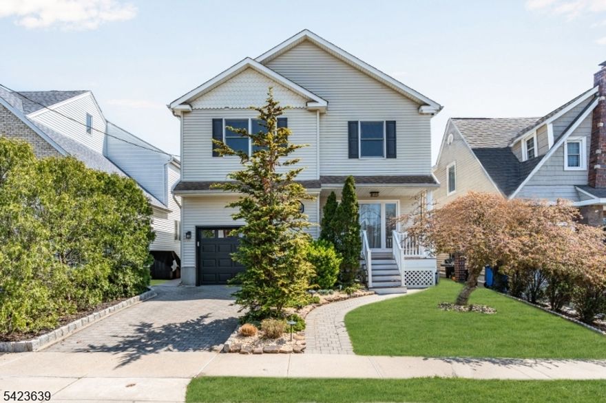 Incredible LOCATION!!! Not only is this home located in the sought after section of North Arlington, NJ but it also only 15 Mins from American Dream Mall, 15 mins from MetLife Stadium/Meadowlands Sports Complex, & only 30 mins from Manhattan! Features include: 5 Bedrooms (including 1st Floor Bedroom), 3.5 Baths, 1 Car Garage, Full Finished Basement w/Full Bath, Hardwood Flooring throughout, Open Floorplan concept, Water Filtration System, Living Room w/Gas Fireplace & Custom Wood Mantle, Large 2nd Floor Loft Area w/Vaulted Ceiling & built in shelving perfect for an office or reading nook. Huge Eat-in Kitchen w/Solid Wood Cabinets, Granite Counters, Tile Backsplash, Stainless Steel Appliances which include Gas Cooktop w/Vented Hood, Wall Oven, Warming Drawer, Dishwasher, & RefrigeratorOwner's Suite features vaulted ceiling, Walk-in Closet w/Built-in Organizers, & Attached Full Bath w/Oversized Vanity, Soaking Tub, & Large Shower Stall w/Rain Showerheads & Frameless Doors.Backyard boasts a large deck off Kitchen w/Composite Deck Boards & Vinyl Railings, Gas Grill, Storage Shed and Inground Heated Saltwater Pool.This area rarely produces an opportunity like this! Don't miss out and schedule an appt today!