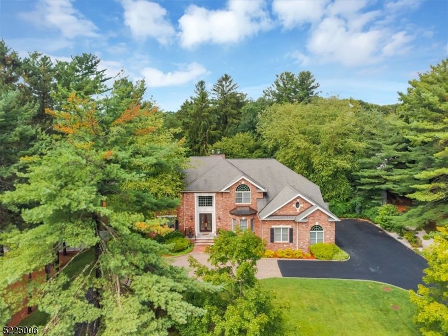 THIS UPDATED CUSTOM 5 /6 BEDROOM COLONIAL HAS IT ALL,INCLUDING THE PRESTIGIOUS "MILL GATE" LOCATION OF FRANKLIN LAKES! YOU ARE WELCOMED INTO THE GLEAMING 2 STORY MARBLE EF, LARGE BANQUET SIZE FOMAL DR, FORMAL LR, TWO-STORY IMPRESSIVE GREAT ROOM/MARBLE FPL AND GRANITE WET BAR, BR/OFFICE,FULL BATH.GOUMET CUSTOM KITCHEN W/ GRANITE TOP CENTER ISLAND & HIGH END APPLIANCES.THE SECOND FLOOR OFFERS PRIMARY SUITE/3 WI CLOSETS/CREMA MARBLE LUXE BATH.EN-SUITE BDRM. TWO BR'S/SHARED UPDATED FULL BATH. FABULOUS WALK OUT FINISHED LOWER LEVEL,OFFERS HOME THEATRE/GRANITE WET BAR/GAME ROOM/FBTH,SAUNA & ADDT'L UPDATED SHOWER + BEDROOM/GYM.CUSTOM DESIGNED WINE & LIQUOR STORAGE FOR THE ENTHUSIASTS & COLLECTORS. RESORT STYLE REAR INCLUDES BOULDER EDGE POOL/SPA WATERFALL, KOI POND/WATERFALL BUILT IN OUTDOOR KITCHEN,HOT TUB, MOON LIGHTING, SURROUND SOUND FOR YEAR ROUND ENTERTAINING.CLOSE PROXIMITY TO THE MARKET BASKET & INDIAN TRAIL CLUB. EUROPEAN CRAFTSMANSHIP CUSTOM WOODWORK THROUGHOUT + GENERATOR.