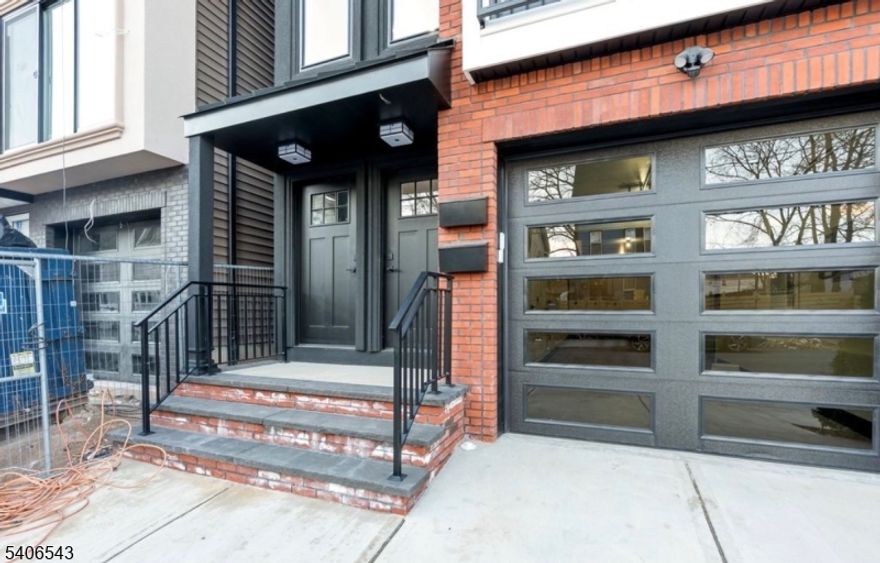 Welcome to this beautifully renovated apartment offering modern comfort and style. This spacious 3-bedroom, 2-bath residence features an open-concept layout with wide-plank hardwood floors throughout and abundant natural light. The contemporary kitchen is equipped with sleek cabinetry, quartz countertops, stainless steel appliances, and a large island perfect for entertaining and everyday living. The primary suite includes a private bath, while the additional bedrooms are generously sized with ample closet space. Enjoy central air and forced-hot-air heating for year-round comfort. Conveniently located near public transportation, major highways, shopping, dining, and local amenities.