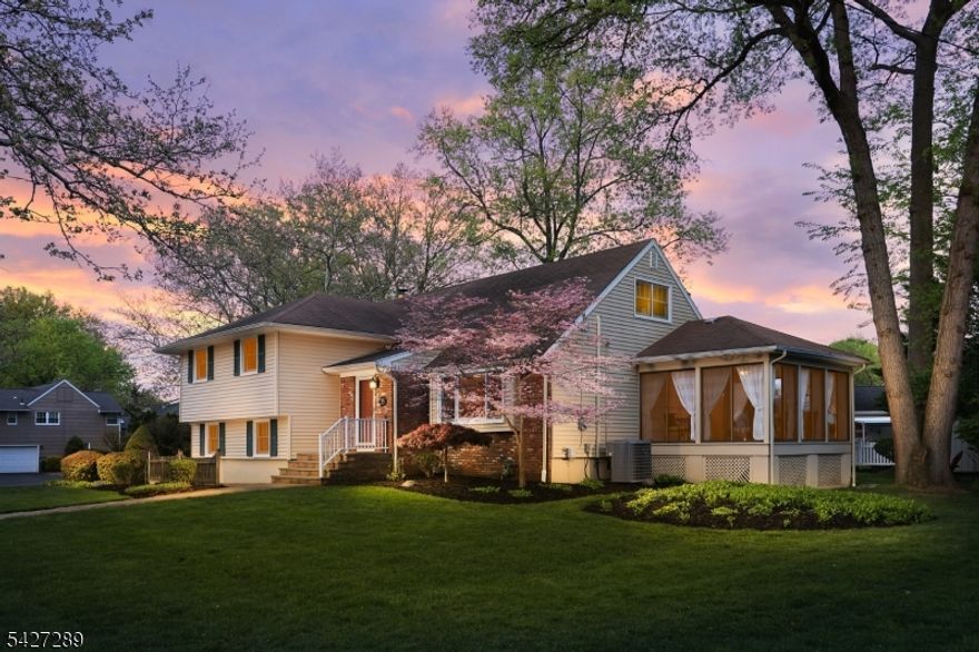 Tucked away in a desirable Westfield location, this inviting home offers exceptional curb appeal that immediately draws you in. Inside, this updated 4-bedroom, 2.1-bath split-level home is truly move-in ready, with many rooms painted within the past five years. Bright, open, and airy, the main level showcases a sun-filled living space. The living room features a large picture window that brings the outdoors in and flows seamlessly into the beautiful kitchen, complete with a center island breakfast bar, granite countertops, Wolf 6-burner stove & SS appliances. Just off the dining room, the standout sunroom boasts three walls of nearly floor-to-ceiling windows and provides direct access to the backyard perfect for relaxing or entertaining. Upstairs, the primary suite offers a private full bath & generous closet space. Two additional well-sized bedrooms & a full hall bath complete this level. The top floor features a fourth bedroom along with ample storage & attic access. On the ground level, the cozy family room includes a wood-burning fireplace and newer flooring, along with a powder room, access to the attached two-car garage, and entry to both the basement & a paver patio overlooking the landscaped backyard. The unfinished basement presents endless possibilities for future living or entertainment space. Conveniently located near top-rated schools and just minutes from vibrant downtown Westfield, this home offers the perfect blend of comfort, style, and everyday convenience.