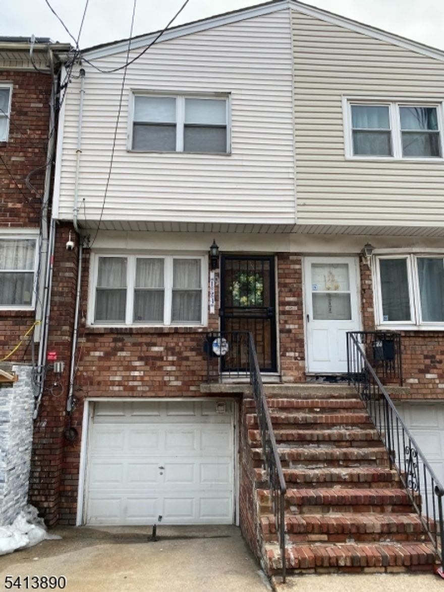 Updated attached single-family home available in the West Bergen section of Jersey City with a short walk to the Hudson-Bergen Light Rail and easy access to Route 440.You'll be excited to find that you will have your own private driveway with a 1 car garage and a cozy, low maintenance backyard.This home offers 2 bedrooms on the second floor with a finished basement converted into a 3rd bedroom that has its own half bathroom. Enjoy a stress free purchase because the house has been thoughtfully maintained and updated throughout the years, offering both comfort and long-term value. Claim your own piece of Jersey City and step into homeownership with location, convenience, and value on your side