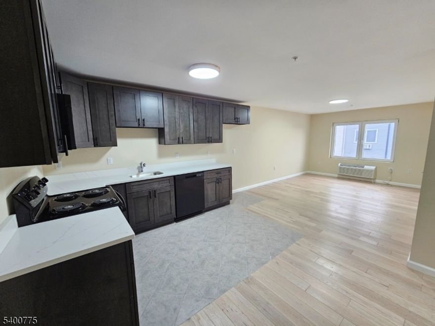 Welcome to this bright and updated 2-bedroom, 1-bath apartment located in a well-maintained building on the corner of South St and Sixth St. This prime location offers excellent walkability with easy access to nearby restaurants, shops, and local conveniences. The unit offers a bright layout with updated finishes, a dishwasher, and an in-unit washer/dryer hookup. Parking available for an additional $150/ month .  Move-in ready and easy to show.