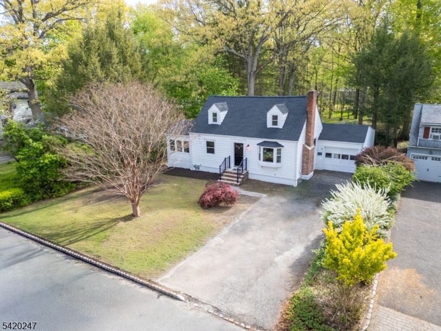Prepare to be captivated by this beautifully transformed 3-bedroom, 2-bath Cape Cod in one of Whippany's most sought-after neighborhoods. Combining classic charm with a "like-new" feel, this home features low property taxes and top-to-bottom updates. The stunning new kitchen boasts white shaker cabinets, quartz countertops, and stainless appliances, flowing seamlessly into a sunlit living room with a gorgeous bay window and wood-burning fireplace. Both full bathrooms have been elegantly reimagined with high-quality tile and modern vanities.Every detail has been addressed, including a new roof, new gutters, a new central AC system, and updated thermopane windows. The interior shines with refinished hardwood floors, fresh paint in timeless gray, and plush new carpeting in the family room. For ultimate flexibility, the primary bedroom can be situated on either the first or second floor. Complete with an oversized one-car garage and a partially finished basement for bonus space, this home is perfectly located just steps from local tennis and pickleball courts. Don't miss this move-in-ready gem!