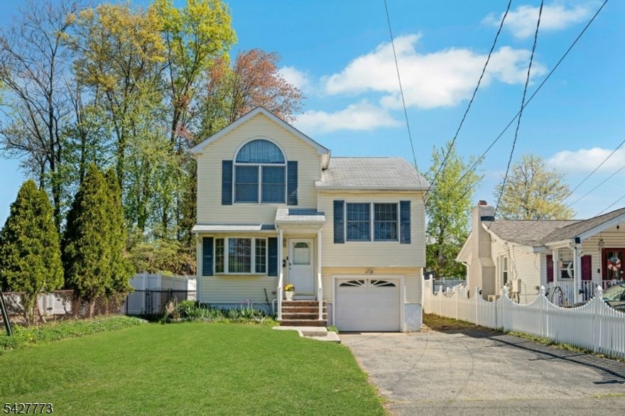Welcome to this beautiful 2003 built split-level home located in the peaceful Lake Hiawatha section of Parsippany. This well-maintained home features three bedrooms, two full bathrooms, hardwood floors throughout, and multi-zone central AC and heating. The first floor offers an open floor plan that includes a living room with dining room area open to the kitchen with breakfast bar. The kitchen provides a view and easy access to the large, fully fenced, level backyard with a walk-out for easy entertaining. On the second floor, you will find two spacious bedrooms and a full hallway bathroom with tub. The third floor is dedicated to the primary bedroom, which features soaring ceilings, a walk-in closet, and a private full bathroom with stall shower. The lower level features a basement room for laundry, utitlities and storage with a walk-out to backyard. Conveniently located, this home is just minutes away from top-rated schools, shopping, dining, major highways, and NYC transit. Do not miss this opportunity to make this beautiful home your own.