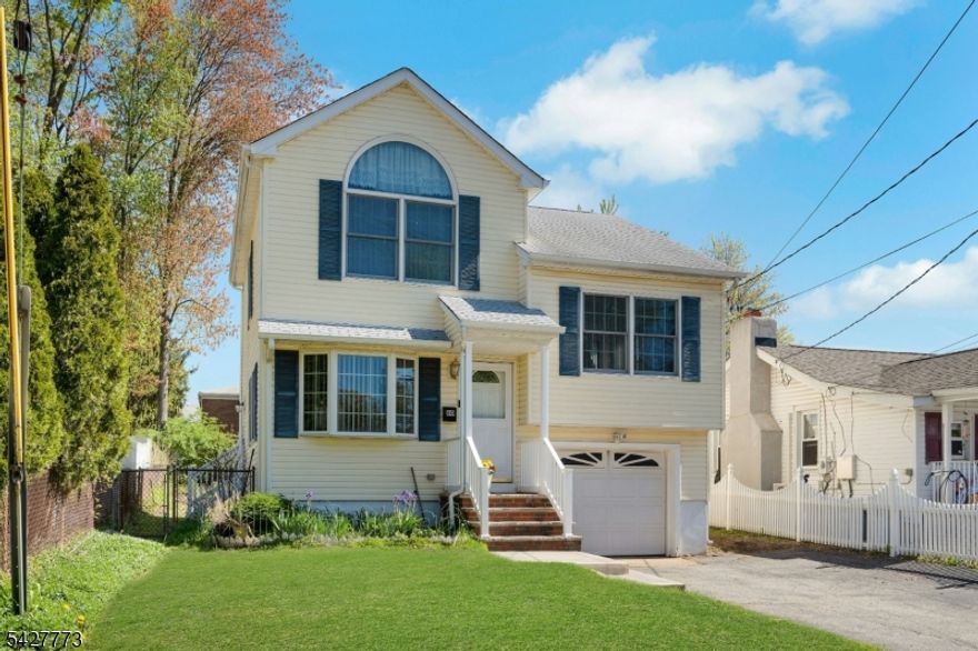 Welcome to this beautiful 2003 built split-level home located in the peaceful Lake Hiawatha section of Parsippany. This well-maintained home features three bedrooms, two full bathrooms, hardwood floors throughout, and multi-zone central AC and heating. The first floor offers an open floor plan that includes a living room with dining room area open to the kitchen with breakfast bar. The kitchen provides a view and easy access to the large, fully fenced, level backyard with a walk-out for easy entertaining. On the second floor, you will find two spacious bedrooms and a full hallway bathroom with tub. The third floor is dedicated to the primary bedroom, which features soaring ceilings, a walk-in closet, and a private full bathroom with stall shower. The lower level features a basement room for laundry, utitlities and storage with a walk-out to backyard. Conveniently located, this home is just minutes away from top-rated schools, shopping, dining, major highways, and NYC transit. Do not miss this opportunity to make this beautiful home your own.