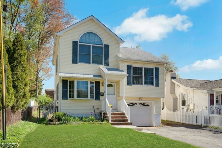 Welcome to this beautiful 2003 built split-level home located in the peaceful Lake Hiawatha section of Parsippany. This well-maintained home features three bedrooms, two full bathrooms, hardwood floors throughout, and multi-zone central AC and heating. The first floor offers an open floor plan that includes a living room with dining room area open to the kitchen with breakfast bar. The kitchen provides a view and easy access to the large, fully fenced, level backyard with a walk-out for easy entertaining. On the second floor, you will find two spacious bedrooms and a full hallway bathroom with tub. The third floor is dedicated to the primary bedroom, which features soaring ceilings, a walk-in closet, and a private full bathroom with stall shower. The lower level features a basement room for laundry, utitlities and storage with a walk-out to backyard. Conveniently located, this home is just minutes away from top-rated schools, shopping, dining, major highways, and NYC transit. Do not miss this opportunity to make this beautiful home your own.