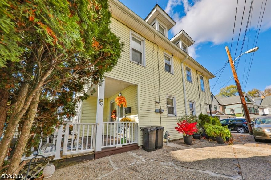 Pride of ownership is evident throughout this spacious 4 bedroom 1.5 bath colonial.  You will appreciate the original beautiful woodwork, columns, staircase, and molding throughout the home. Hardwood floors flow  through the living room, dining room and foyer and are in excellent condition. The eat in kitchen features a pantry, plenty of counter space, and has a door that leads to an oversized side deck, perfect for unwinding and dining al fresco. The interior offers cherry and bright rooms. Upstairs features three great sized bedrooms, and a full bath, with an additional half bath and convenient laundry room at the end of the hall.  The third floor offers a wonderful 4th bedroom with plenty of closet space. When the leaves begin to fall, you can relax on the stately porch and enjoy views of the Delaware River in the distance and overlook a well sized fenced in back yard.. Many updates have been done to the home including replacement windows, moving the washer/dryer to the second floor, installing a NAVIEN condensing combo gas boiler and water heater, new lighting in the kitchen, the deck added to the side of the home. You can't beat the location, conveniently located minutes to the Pennsylvania border and routes 22 and 78, with hospitals and shopping nearby. The home is meticulous and ready to just move in and enjoy!