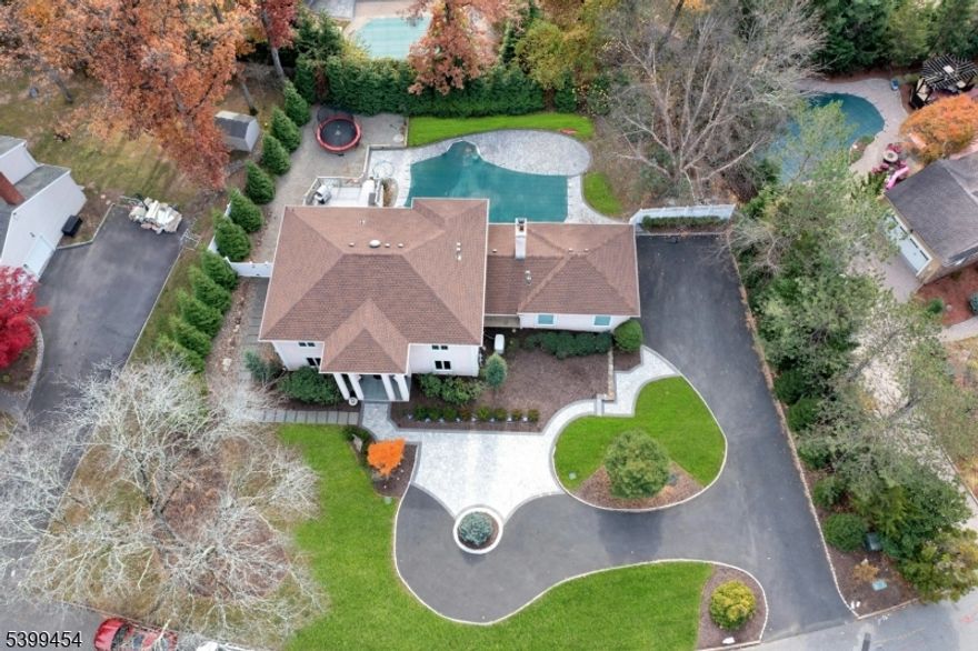 WELCOME TO THIS IMPRESSIVE CUSTOM COLONIAL IN NORTHERN RIVER VALES'S PRESTIGIOUS VICTORIA ESTATES!  It's unique Luxury appeal is enhanced by a circular drive w/Belgian block & the two-story entry foyer welcomes you in, setting the tone for sophistication in every room. Entertain in style in the banquet-sized dining room & gather in the expansive Great Room featuring a marble fireplace & wall of windows overlooking this private pool setting. Thoughtfully crafted with European influences, this contemporary kitchen is tailored for both serious cooking and gracious hosting. The breakfast bar and dining area open directly to the Great Room & rear outdoor living on deck & the stunning in-ground pool. A seamless setting for daily life & memorable gatherings is offered here.  The main level also offers both a bright office/formal living room & a private guest suite with a full bath.  Upstairs, the huge primary suite is complete with an oversized master bath & generous walk-in closet, plus 2-3 bedrooms ensuite. The large basement expands your living space, featuring a sauna, full bath,  private office, and direct access to the pool & rear yard. Conveniently located near top rated schools, parks, shopping and easy NYC transportation. This home combines luxury and convenience in one exceptional package. This home truly has it all don't miss the chance to make it yours!